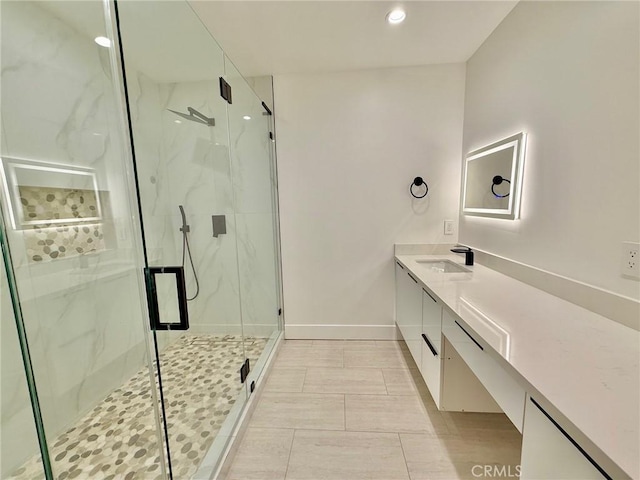 6904 Corbin Ave, Reseda, CA 91335 - bathroom with vanity, a marble finish shower, and recessed lighting