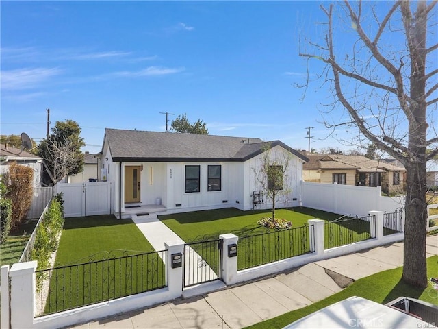 6904 Corbin Ave, Reseda, CA 91335 - view of front of property with a gate, a fenced front yard, and board and batten siding