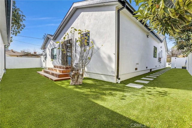 6904 Corbin Ave, Reseda, CA 91335 - back of house featuring a fenced backyard and stucco siding