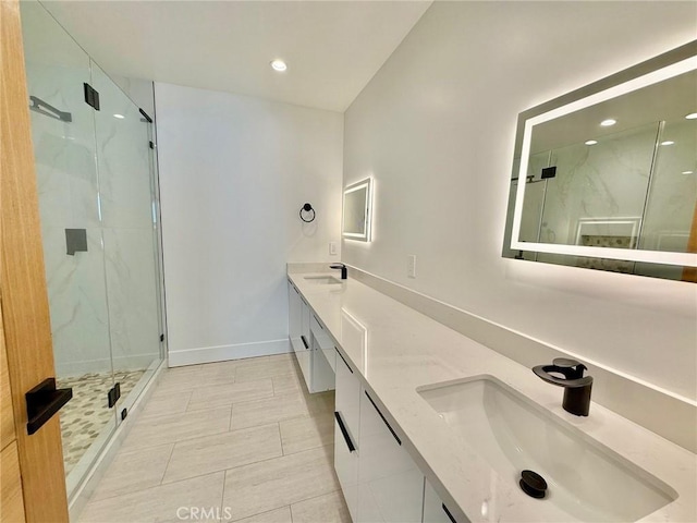 6904 Corbin Ave, Reseda, CA 91335 - bathroom featuring a marble finish shower, double vanity, and recessed lighting
