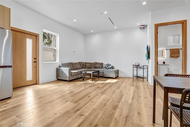 6904 Corbin Ave, Reseda, CA 91335 - living room with light wood finished floors and recessed lighting