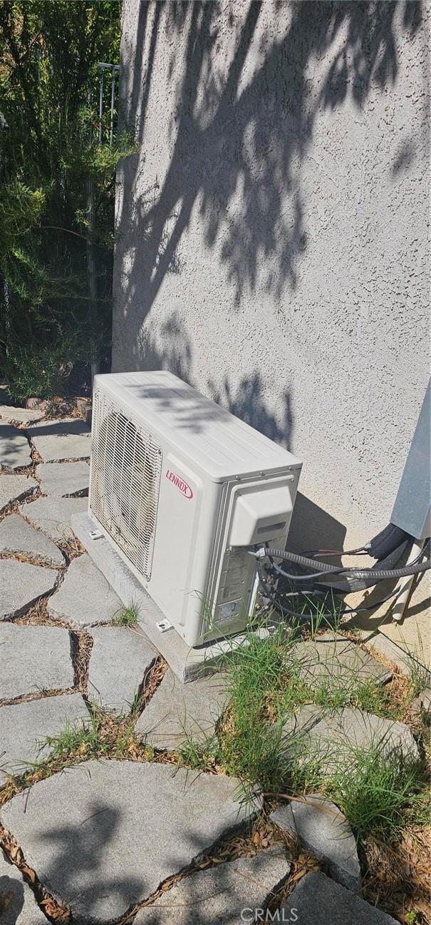 5827 Corbin Ave, Tarzana, CA 91356 - exterior view of an ac unit and stucco siding