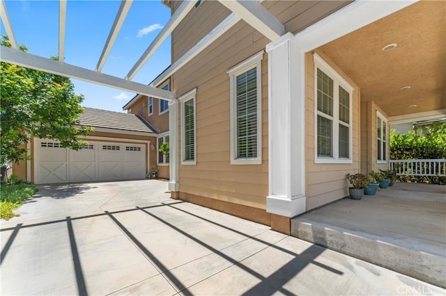 28549 Oakhurst Way, Temecula, CA 92591 - view of patio / terrace with a garage and driveway