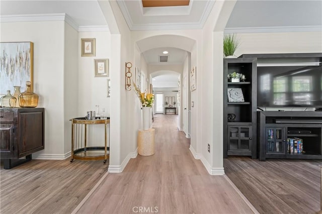 28549 Oakhurst Way, Temecula, CA 92591 - hallway featuring wood finished floors, arched walkways, and ornamental molding