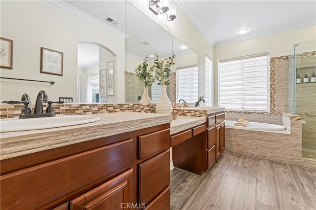 28549 Oakhurst Way, Temecula, CA 92591 - full bath with a garden tub, double vanity, tiled shower, wood finished floors, and ornamental molding