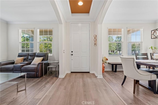 28549 Oakhurst Way, Temecula, CA 92591 - entryway with light wood-style floors, healthy amount of natural light, crown molding, and arched walkways