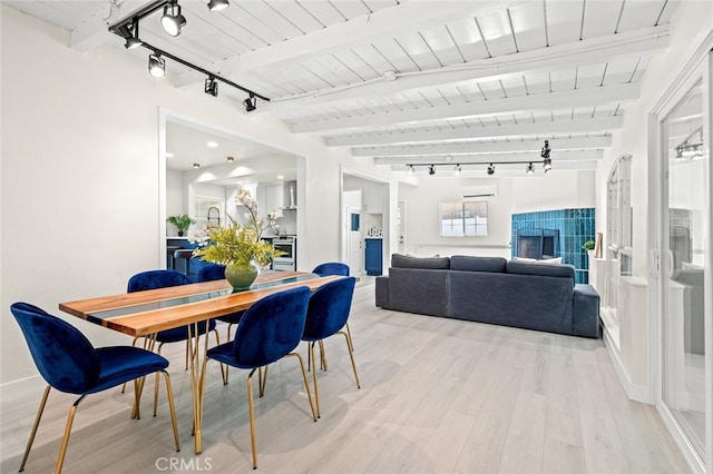 647 Magnolia Ave, Brea, CA 92821 - dining area featuring track lighting, light wood finished floors, and a wood ceiling with exposed beams