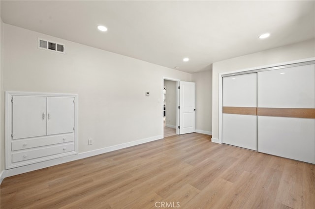647 Magnolia Ave, Brea, CA 92821 - unfurnished bedroom featuring light wood-style flooring, recessed lighting, and a closet