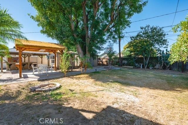 647 Magnolia Ave, Brea, CA 92821 - fenced backyard featuring a gazebo and a patio area