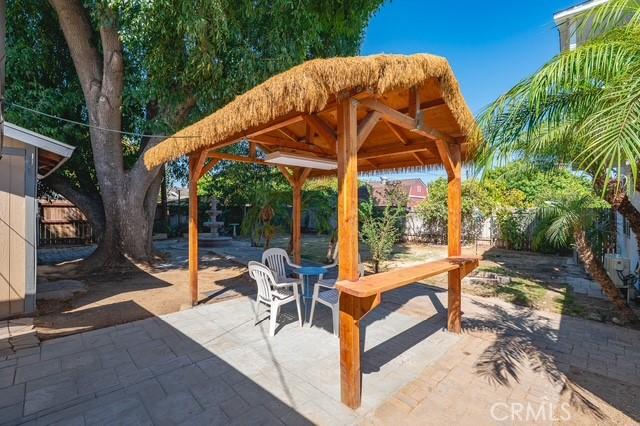 647 Magnolia Ave, Brea, CA 92821 - fenced backyard featuring a patio area and a gazebo