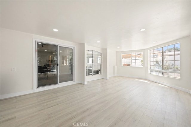 647 Magnolia Ave, Brea, CA 92821 - unfurnished living room with light wood finished floors and recessed lighting