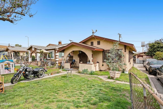 1156 S Alma Ave, Los Angeles, CA 90023 - view of front of home with stucco siding