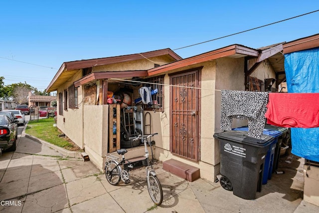 1156 S Alma Ave, Los Angeles, CA 90023 - view of home's exterior with stucco siding