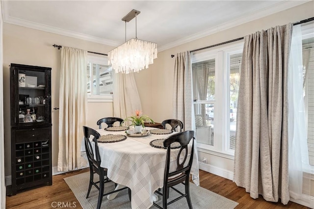 20108 Wayne Ave, Torrance, CA 90503 - dining space with wood finished floors, ornamental molding, and a chandelier