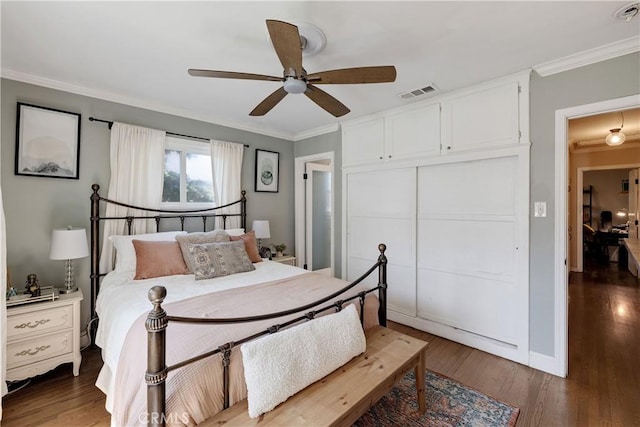 20108 Wayne Ave, Torrance, CA 90503 - bedroom with crown molding, a closet, wood finished floors, and a ceiling fan