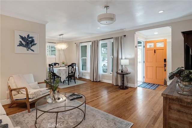 20108 Wayne Ave, Torrance, CA 90503 - living area featuring light wood-style flooring, crown molding, recessed lighting, and a chandelier