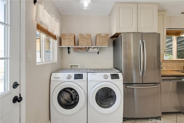 20108 Wayne Ave, Torrance, CA 90503 - laundry room featuring washing machine and dryer and light tile patterned floors