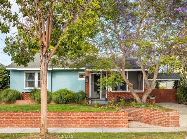 20108 Wayne Ave, Torrance, CA 90503 - view of property hidden behind natural elements featuring stucco siding, brick siding, and a shingled roof