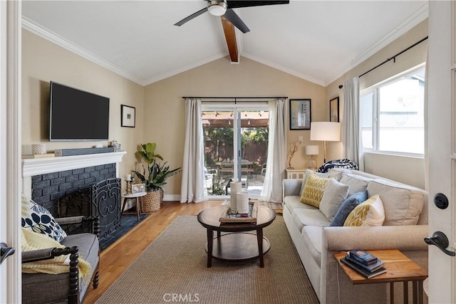 20108 Wayne Ave, Torrance, CA 90503 - living area with a ceiling fan, wood finished floors, and a brick fireplace