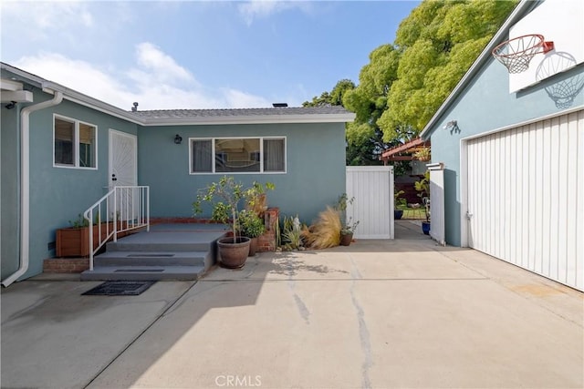 20108 Wayne Ave, Torrance, CA 90503 - view of exterior entry with stucco siding and a garage