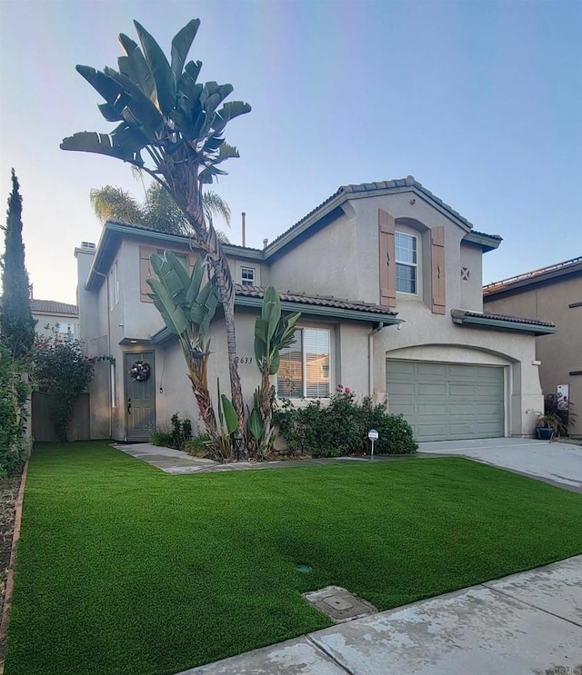 2633 Lightning Trail Ln, Chula Vista, CA 91915 - mediterranean / spanish home featuring stucco siding, a garage, driveway, and a front lawn
