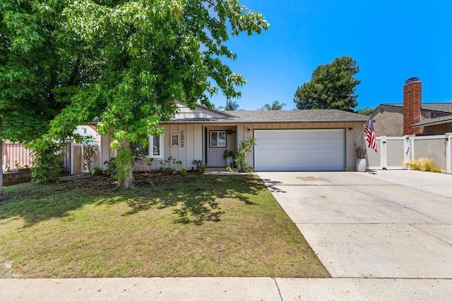 10048 Waynecrest Ln, Santee, CA 92071 - view of front of house featuring a garage, board and batten siding, and driveway