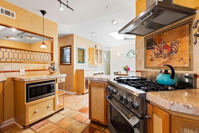 10048 Waynecrest Ln, Santee, CA 92071 - kitchen featuring stainless steel appliances, ventilation hood, tasteful backsplash, track lighting, and hanging light fixtures