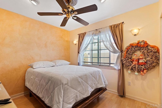 10048 Waynecrest Ln, Santee, CA 92071 - bedroom featuring wood finished floors and a ceiling fan