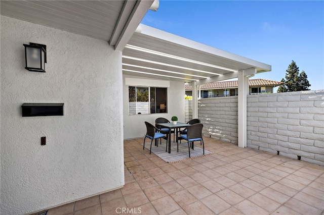 2133 Via Puerta Unit A, Laguna Woods, CA 92637 - view of patio with outdoor dining area