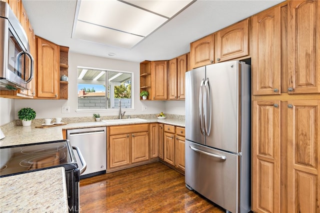 2133 Via Puerta Unit A, Laguna Woods, CA 92637 - kitchen with stainless steel appliances, open shelves, dark wood finished floors, and light countertops
