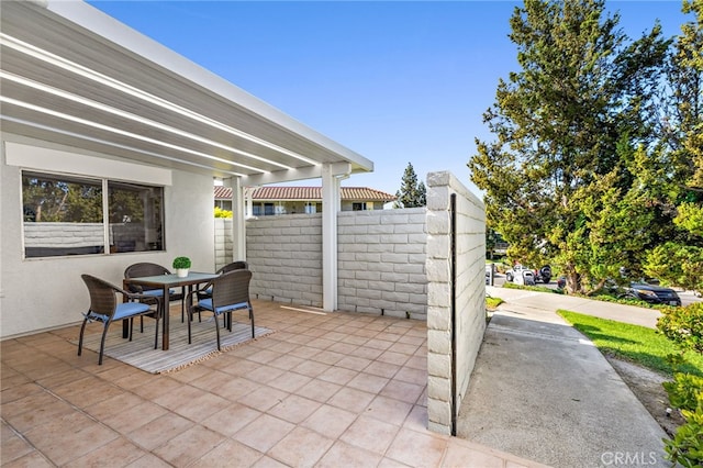 2133 Via Puerta Unit A, Laguna Woods, CA 92637 - view of patio featuring outdoor dining space