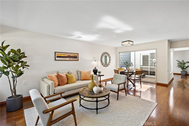 2133 Via Puerta Unit A, Laguna Woods, CA 92637 - living area featuring hardwood / wood-style floors and baseboards
