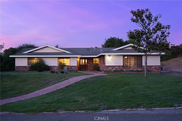 320 Casa Real Pl, Nipomo, CA 93444 - ranch-style home featuring a yard, stucco siding, and brick siding