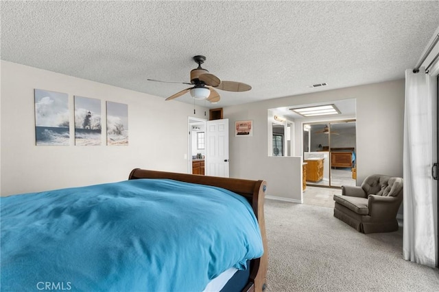 320 Casa Real Pl, Nipomo, CA 93444 - bedroom with carpet, a textured ceiling, a ceiling fan, and connected bathroom