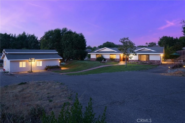 320 Casa Real Pl, Nipomo, CA 93444 - single story home with dirt driveway, a yard, and stucco siding