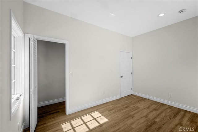 4251 Gundry Ave, Long Beach, CA 90807 - unfurnished bedroom featuring wood finished floors and recessed lighting