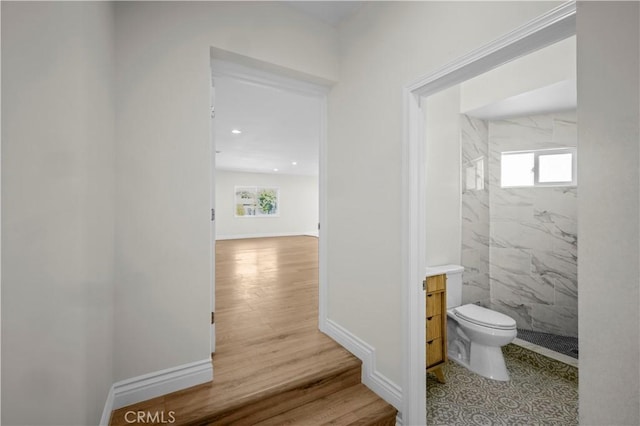 4251 Gundry Ave, Long Beach, CA 90807 - full bath with a marble finish shower, vanity, and wood finished floors