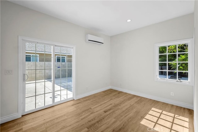 4251 Gundry Ave, Long Beach, CA 90807 - empty room with a wall mounted air conditioner, wood finished floors, and recessed lighting
