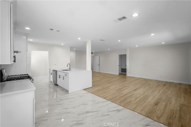 4251 Gundry Ave, Long Beach, CA 90807 - kitchen featuring range, white cabinets, light countertops, dishwasher, and recessed lighting