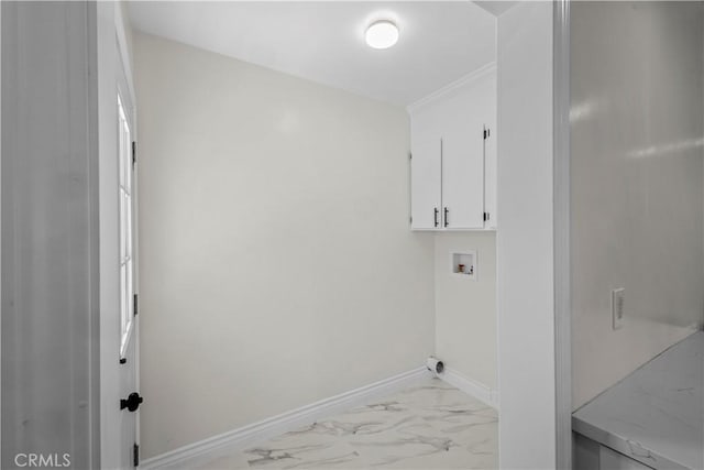 4251 Gundry Ave, Long Beach, CA 90807 - laundry room featuring light marble finish flooring, cabinet space, hookup for a washing machine, and ornamental molding