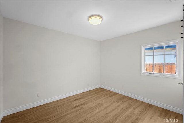 4251 Gundry Ave, Long Beach, CA 90807 - spare room featuring light wood-style floors and baseboards