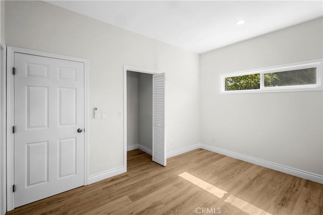 4251 Gundry Ave, Long Beach, CA 90807 - unfurnished bedroom featuring wood finished floors and baseboards