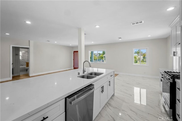 4251 Gundry Ave, Long Beach, CA 90807 - kitchen with dishwasher, black range with gas cooktop, open floor plan, light marble finish floors, and recessed lighting