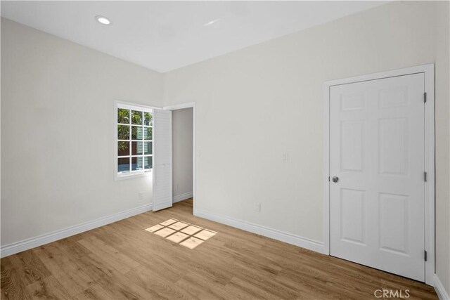 4251 Gundry Ave, Long Beach, CA 90807 - unfurnished room with wood finished floors and recessed lighting