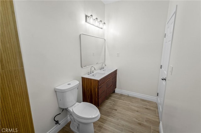 4251 Gundry Ave, Long Beach, CA 90807 - bathroom featuring double vanity and wood finished floors