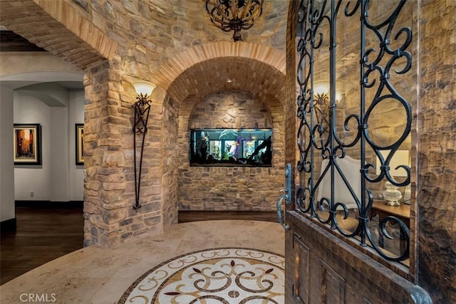 25492 Spotted Pony Ln, Laguna Hills, CA 92653 - wine room with wood finished floors and arched walkways