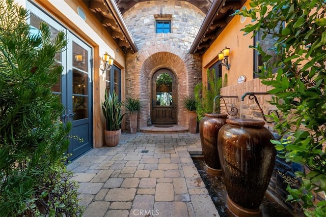 25492 Spotted Pony Ln, Laguna Hills, CA 92653 - doorway to property with stone siding and french doors