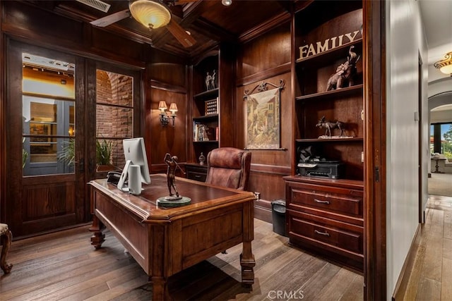 25492 Spotted Pony Ln, Laguna Hills, CA 92653 - office space featuring hardwood / wood-style floors, a ceiling fan, wood walls, a wood ceiling with exposed beams, and built in shelves