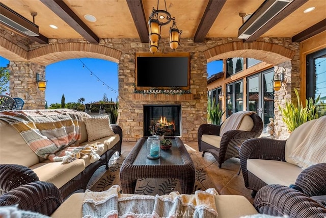 25492 Spotted Pony Ln, Laguna Hills, CA 92653 - view of patio with an outdoor living space with a fireplace