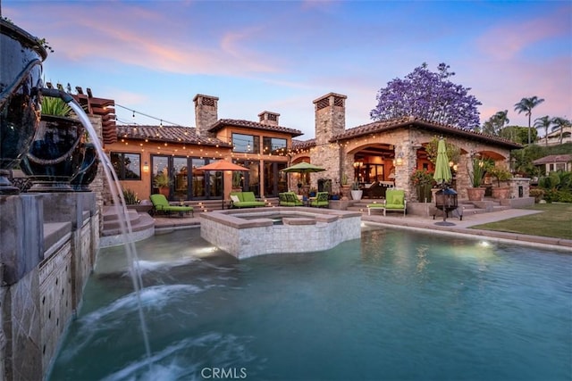 25492 Spotted Pony Ln, Laguna Hills, CA 92653 - view of pool featuring a patio and a pool with connected hot tub